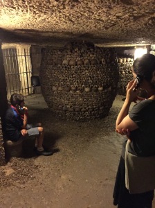 Listening to audio in Les Catacombes